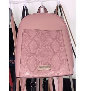 London Fog Pink Backpack Used Once Affordable | Great to Travel | Pocket upfront